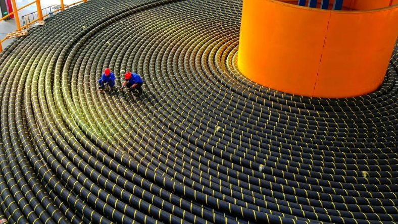 Engineers working on a high-voltage subsea cable system